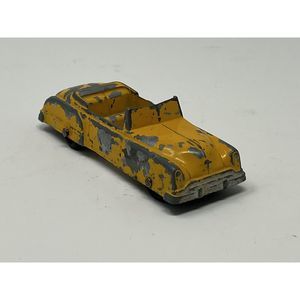 1949 OLDSMOBILE CONVERTIBLE YELLOW TOOTSIETOY CAR
